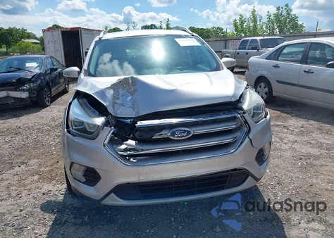2017 Ford Escape Titanium z USA, uszkodzony, nr VIN 1FMCU9J93HUE43374